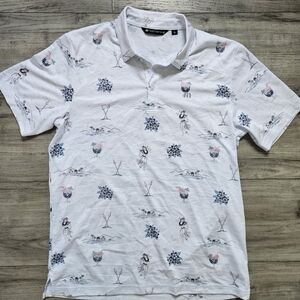 Travis Mathew Golf Hawaiian Polo all over print size larg
